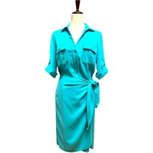 Faux wrap safari dress , size 10. Stunning turquoise color